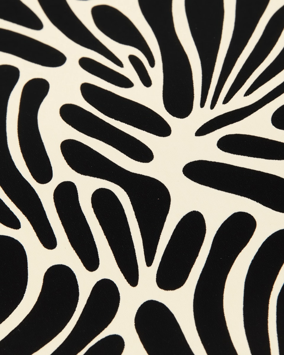 A world map with financial graphs overlay.